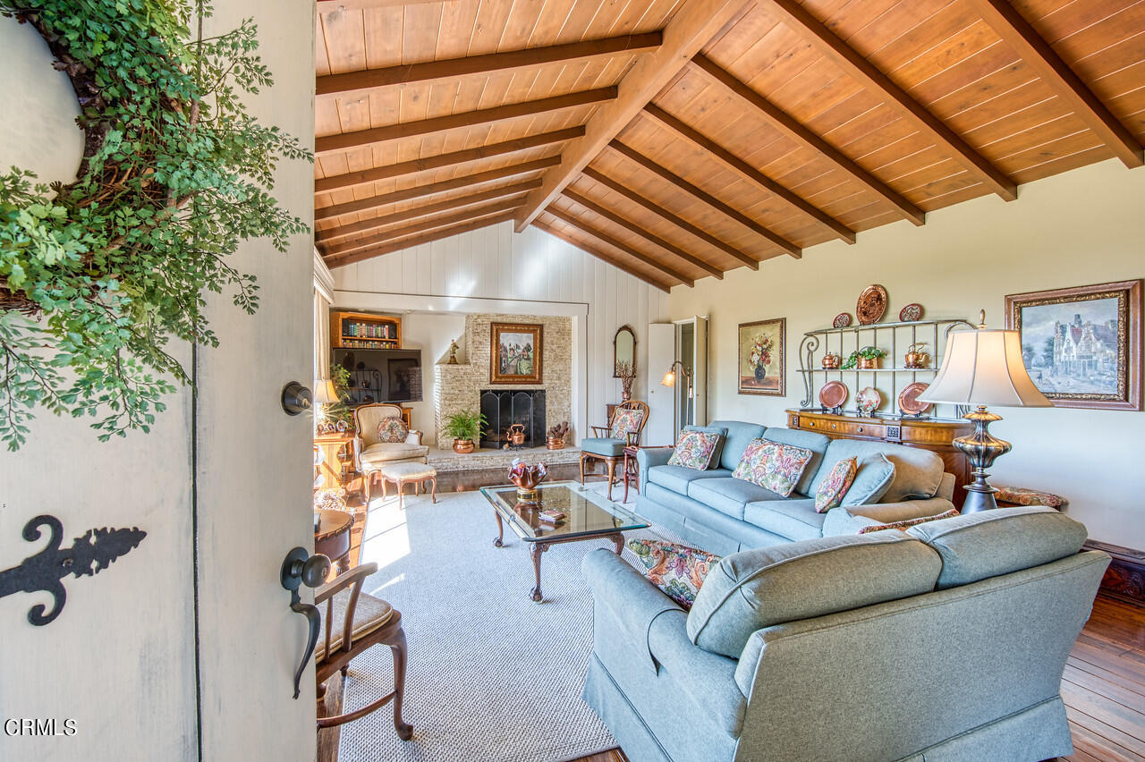 3320 Calvert Road Pasadena, CA 91107 - Photo 7 of 27 a living room with furniture and a potted plant