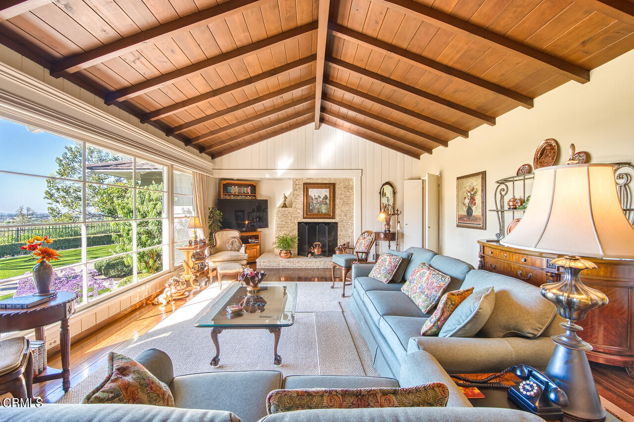 3320 Calvert Road Pasadena, CA 91107 - Photo 8 of 27 a living room with furniture and a large window