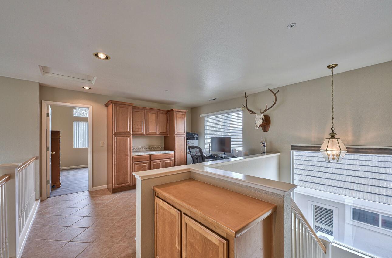 18067 Stonehaven Salinas, CA 93908 - Photo 17 of 33 a kitchen with a refrigerator sink and cabinets