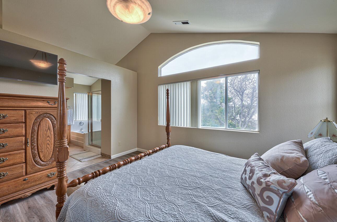 18067 Stonehaven Salinas, CA 93908 - Photo 20 of 33 a bedroom with a bed and window