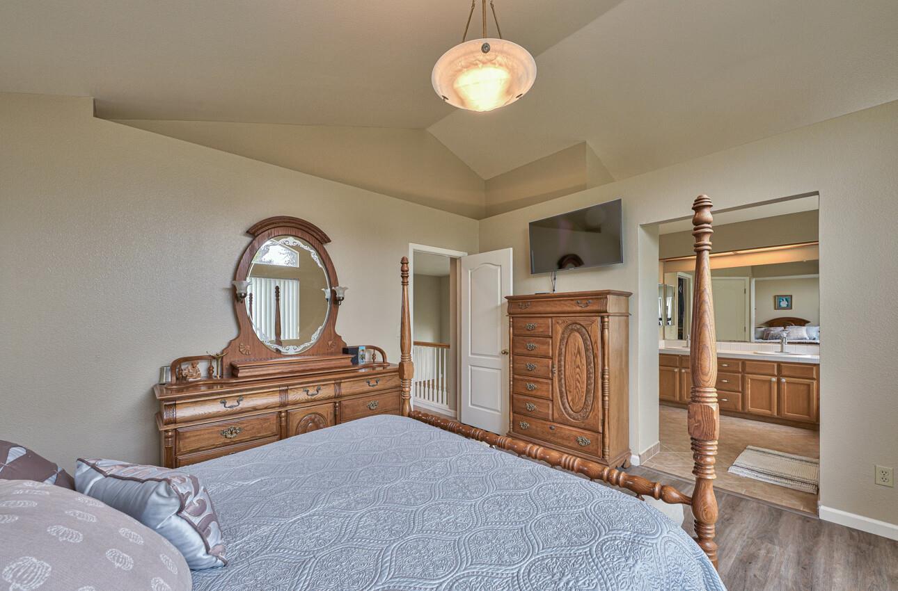 18067 Stonehaven Salinas, CA 93908 - Photo 21 of 33 a bedroom with a bed and a television
