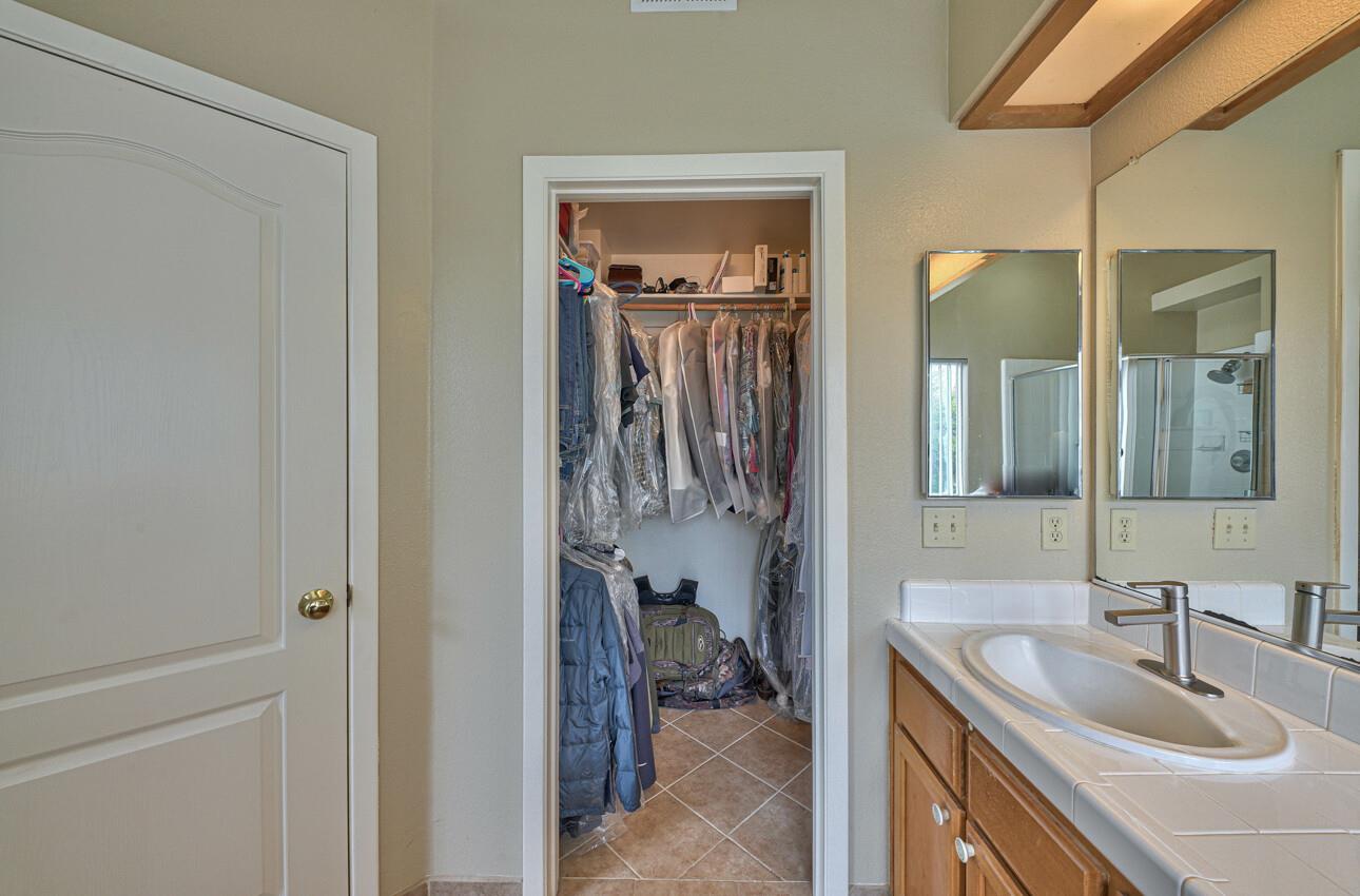 18067 Stonehaven Salinas, CA 93908 - Photo 24 of 33 a en suite bathroom with a sink and a mirror