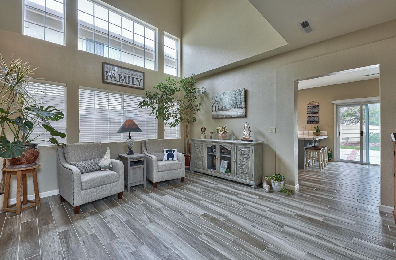 18067 Stonehaven Salinas, CA 93908 - Photo 6 of 33 a living room with furniture and wooden floor