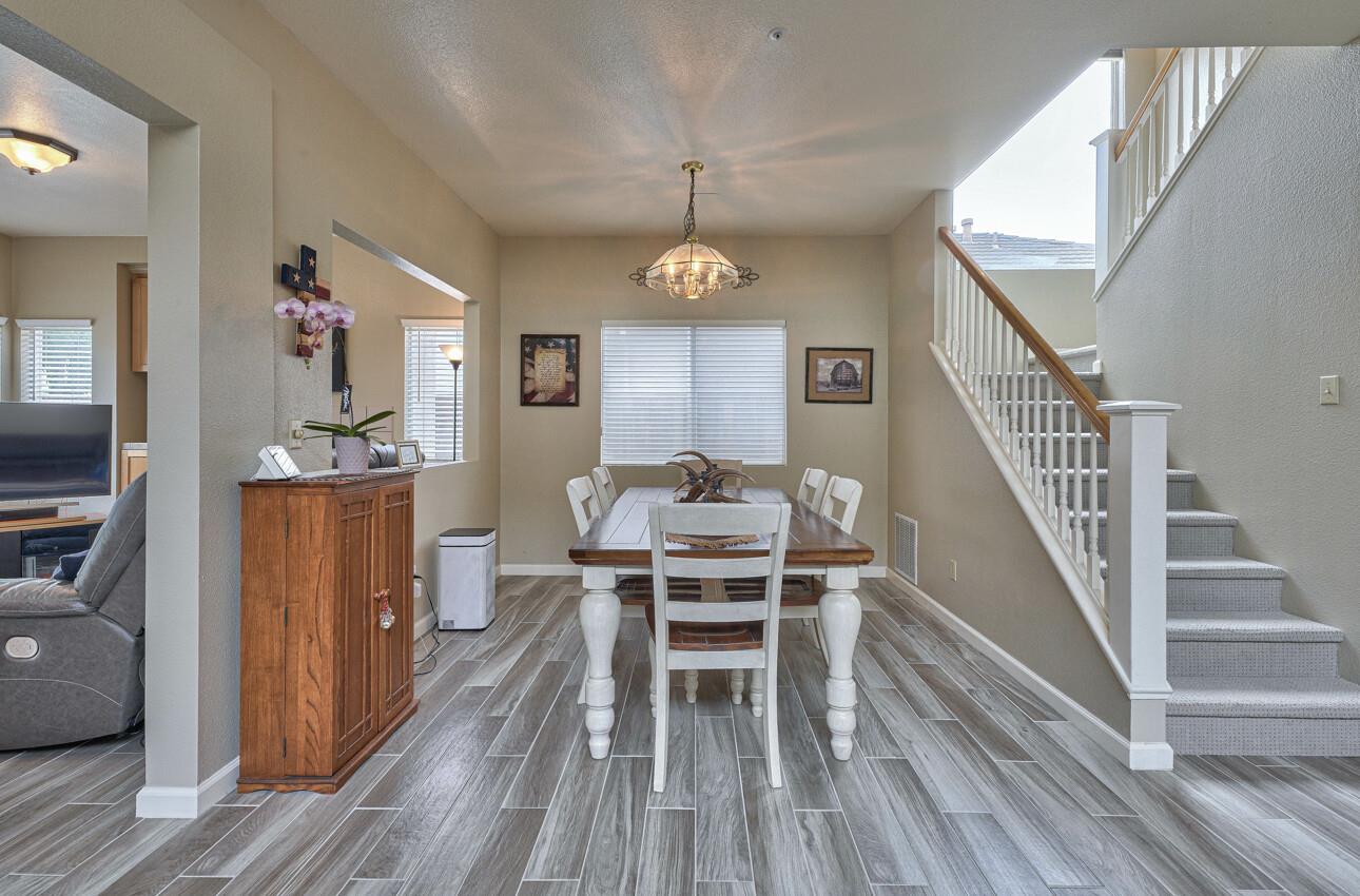 18067 Stonehaven Salinas, CA 93908 - Photo 7 of 33 a view of a dining room with furniture window and wooden floor