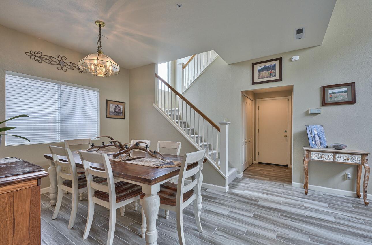 18067 Stonehaven Salinas, CA 93908 - Photo 8 of 33 a view of a dining room with furniture wooden floor and a chandelier