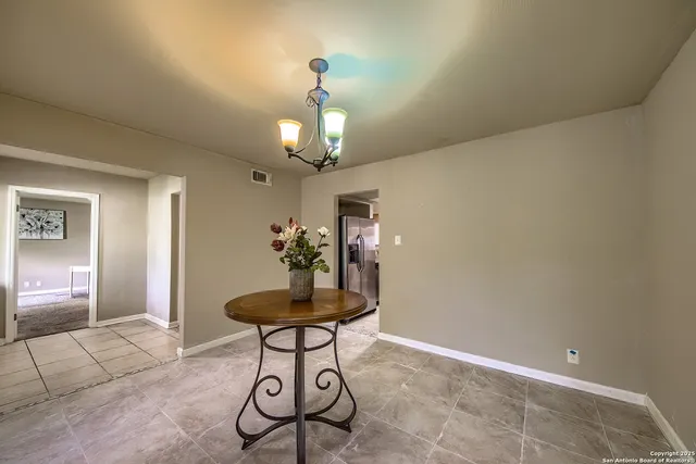 a view of a chandelier in a room