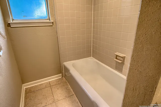 a bathroom with a bathtub