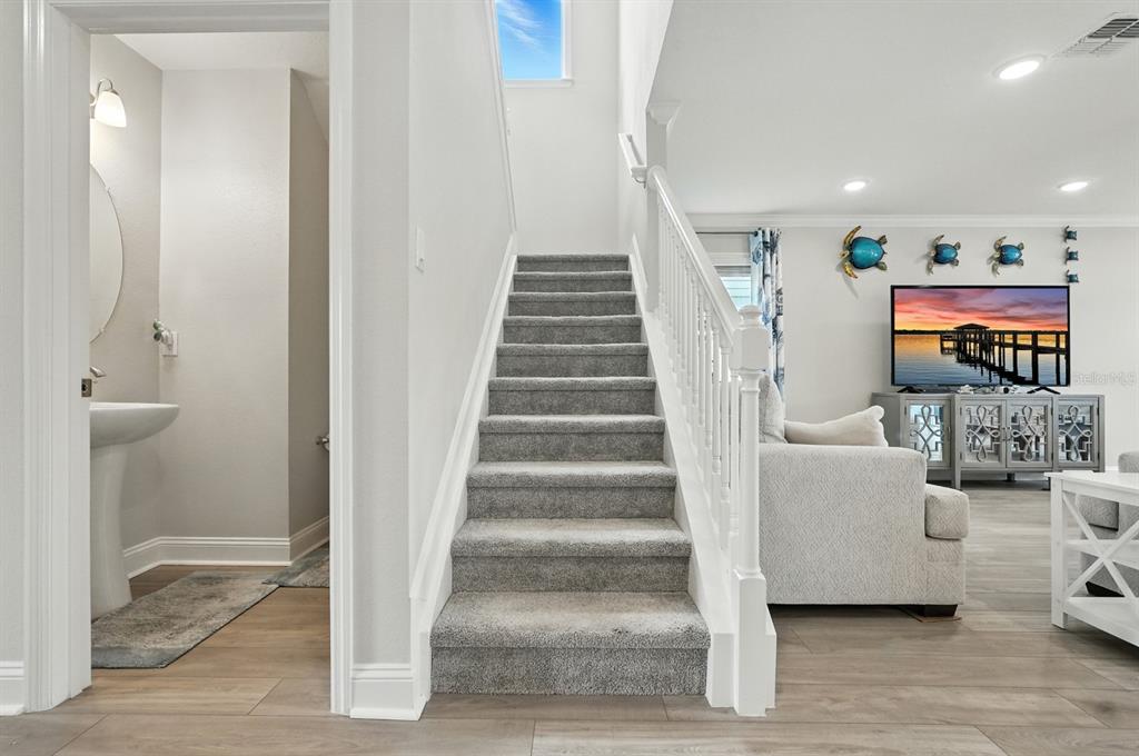 28 Ridge Road Palm Coast, FL 32137 - Photo 24 of 57 a view of entryway and hall with wooden floor