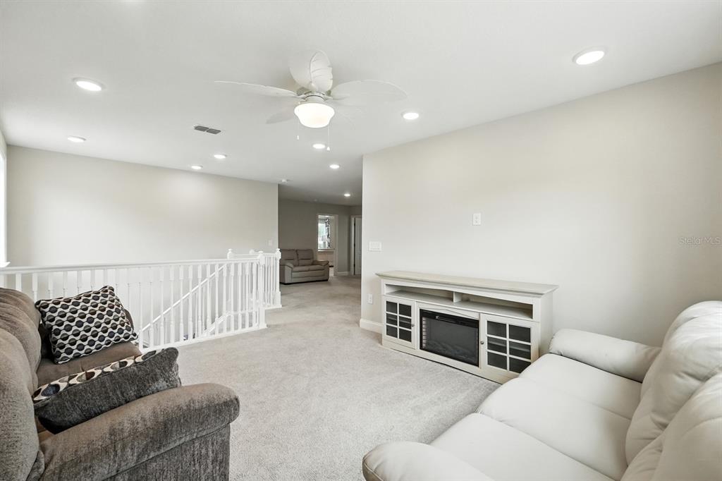 28 Ridge Road Palm Coast, FL 32137 - Photo 26 of 57 a living room with furniture