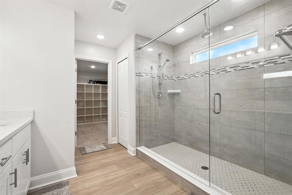 28 Ridge Road Palm Coast, FL 32137 - Photo 32 of 57 a bathroom with a shower