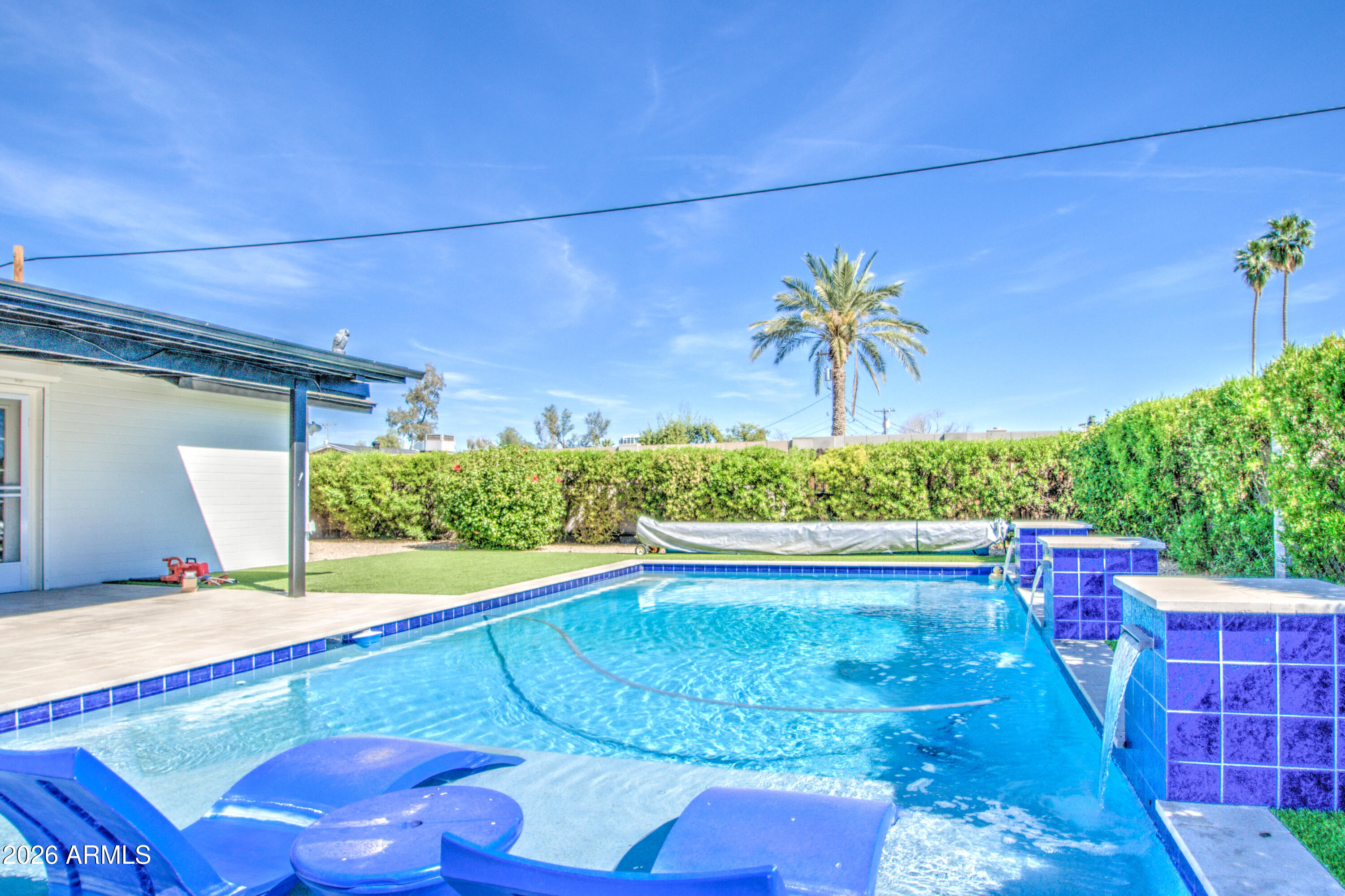 1203 West Elna Rae Street Tempe, AZ 85281 - Photo 12 of 34 a view of swimming pool with seating space