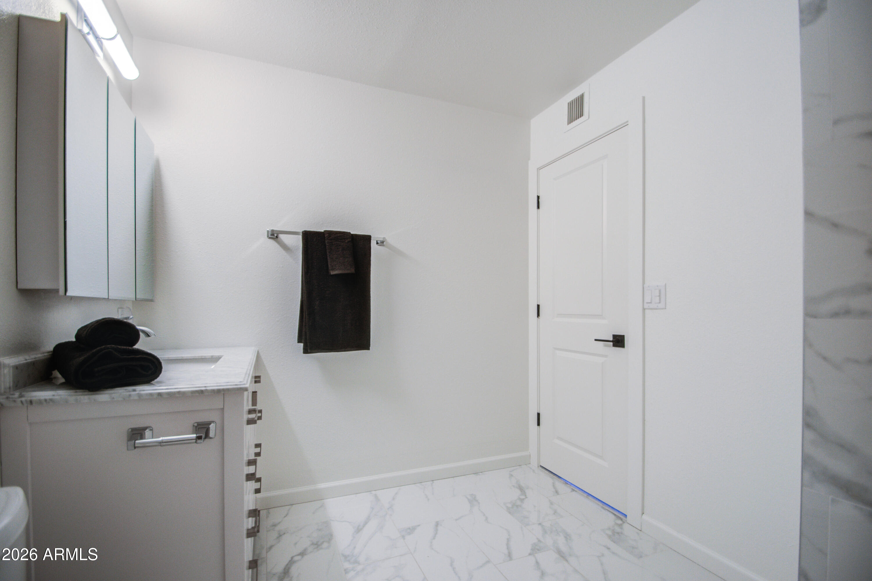 1203 West Elna Rae Street Tempe, AZ 85281 - Photo 13 of 34 a view of a storage & utility room in a house