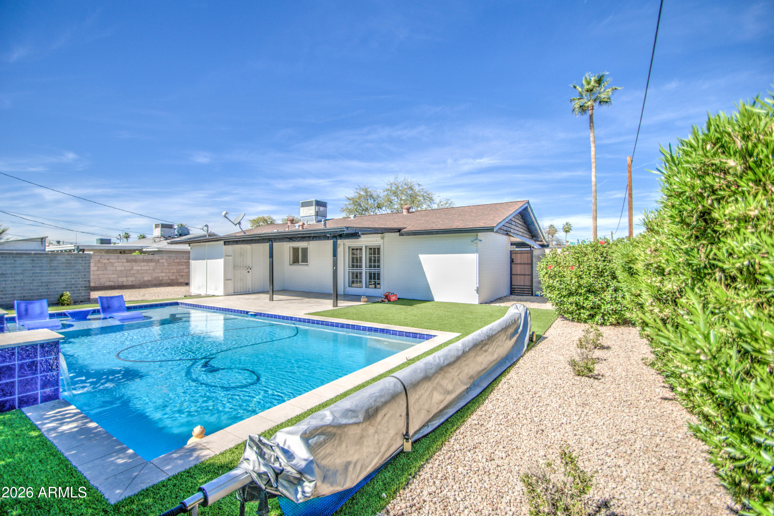 1203 West Elna Rae Street Tempe, AZ 85281 - Photo 33 of 34 a view of a backyard with chairs