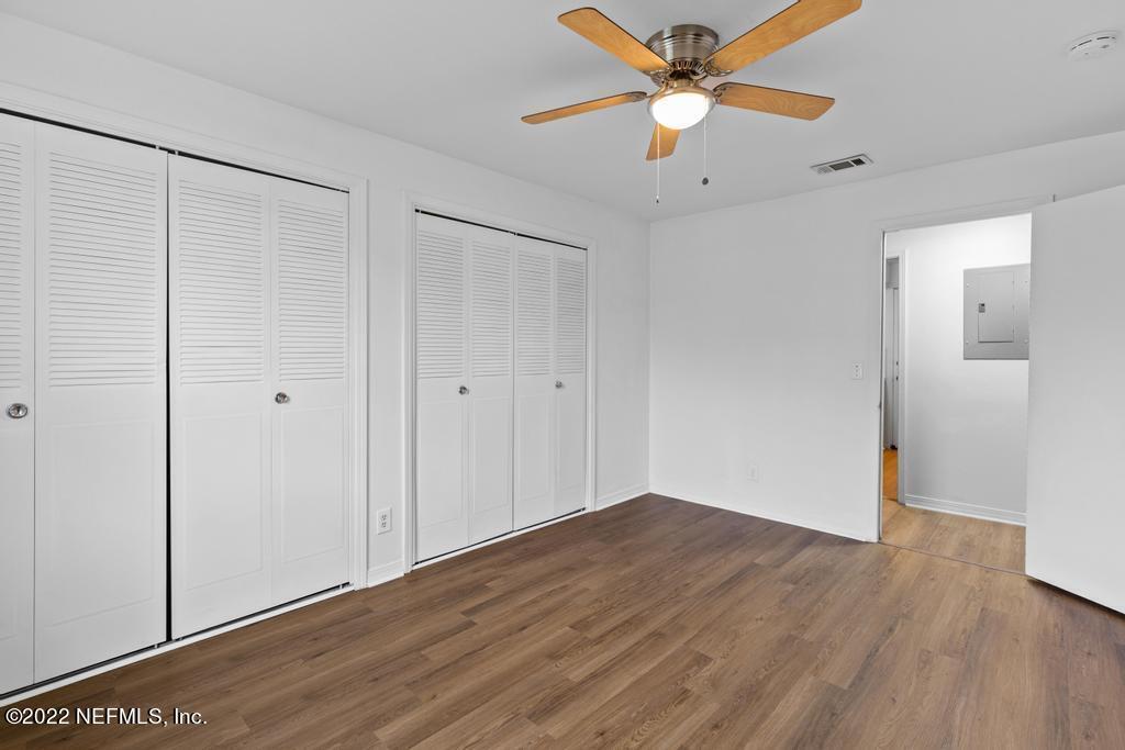 1647 El Camino Road, Unit 5 Jacksonville, FL 32216 - Photo 19 of 44 a view of an empty room with wooden floor