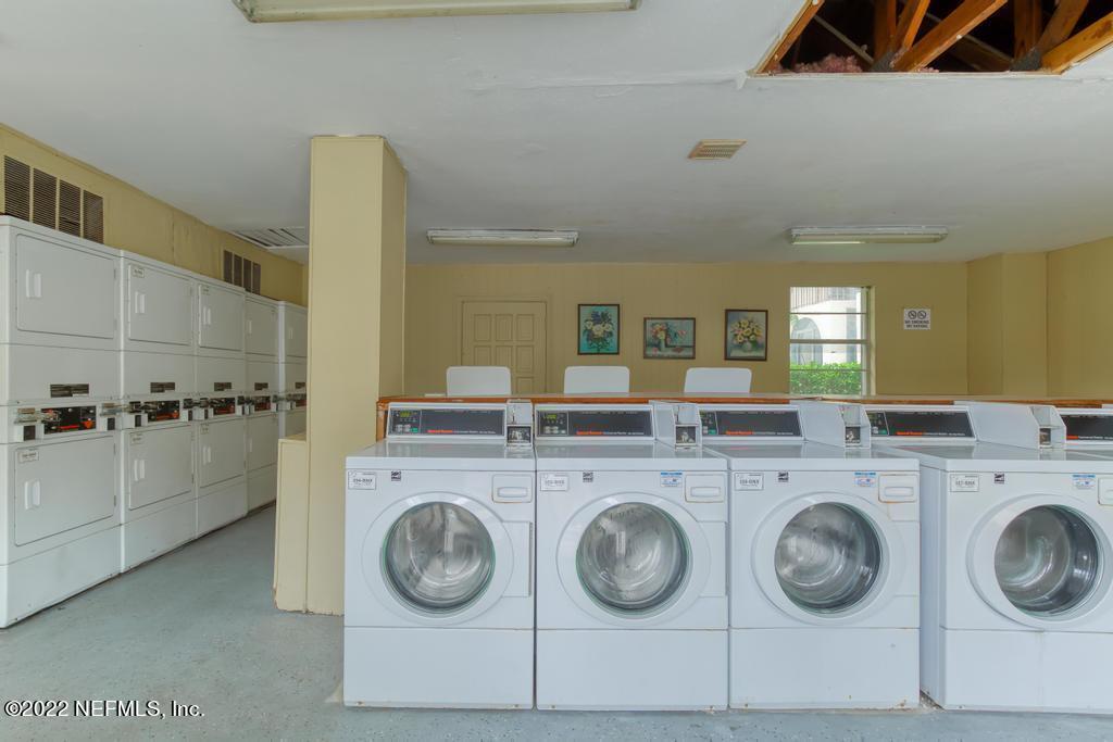 1647 El Camino Road, Unit 5 Jacksonville, FL 32216 - Photo 34 of 44 a utility room with dryer and washer