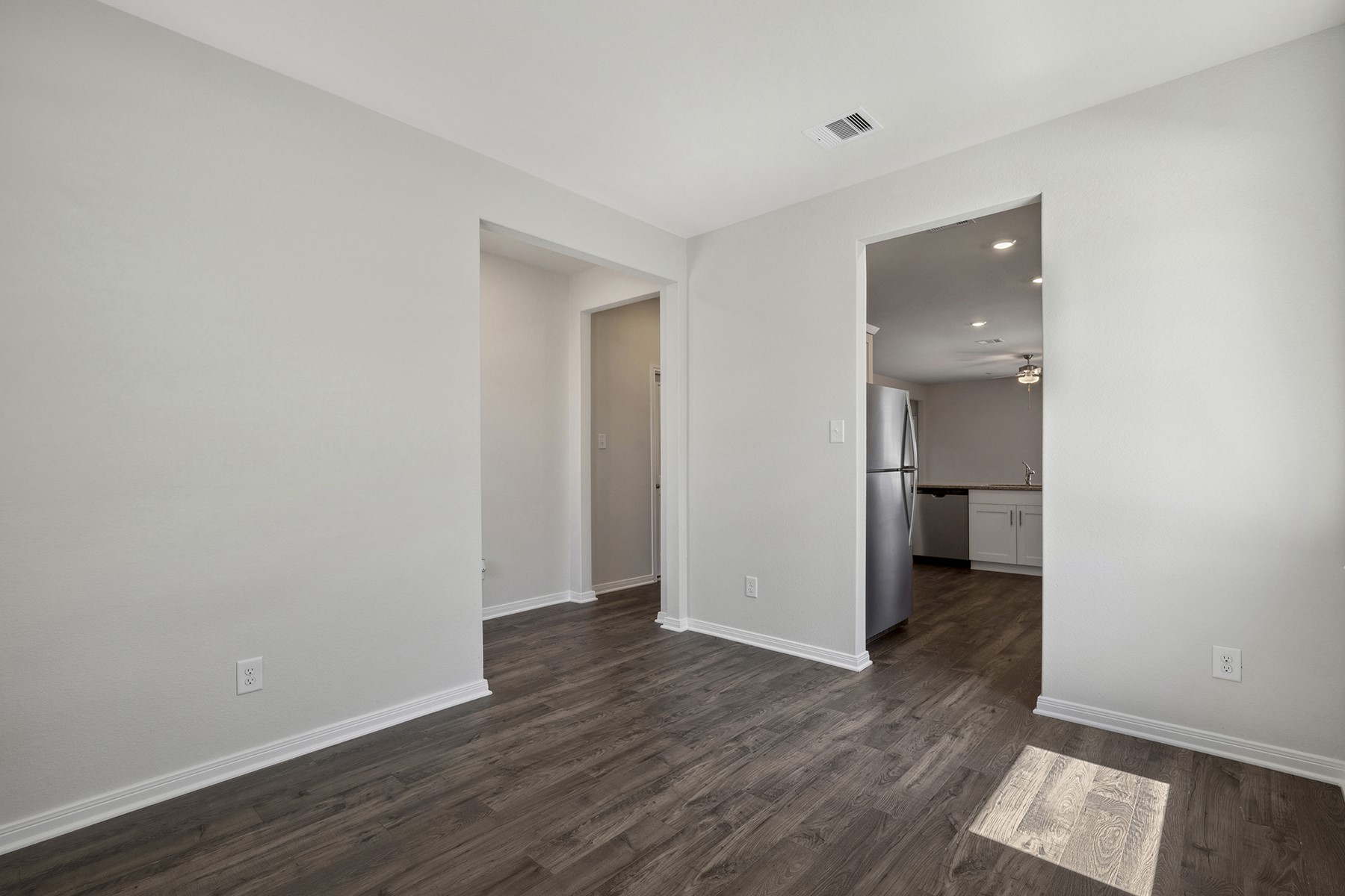 10338 Red Cardinal Drive Cleveland, TX 77328 - Photo 5 of 25 a view of a room with wooden floor and a sink