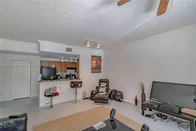 $255,000 | 5860 West Sample Road, Unit 104, Coral Springs, FL 33067