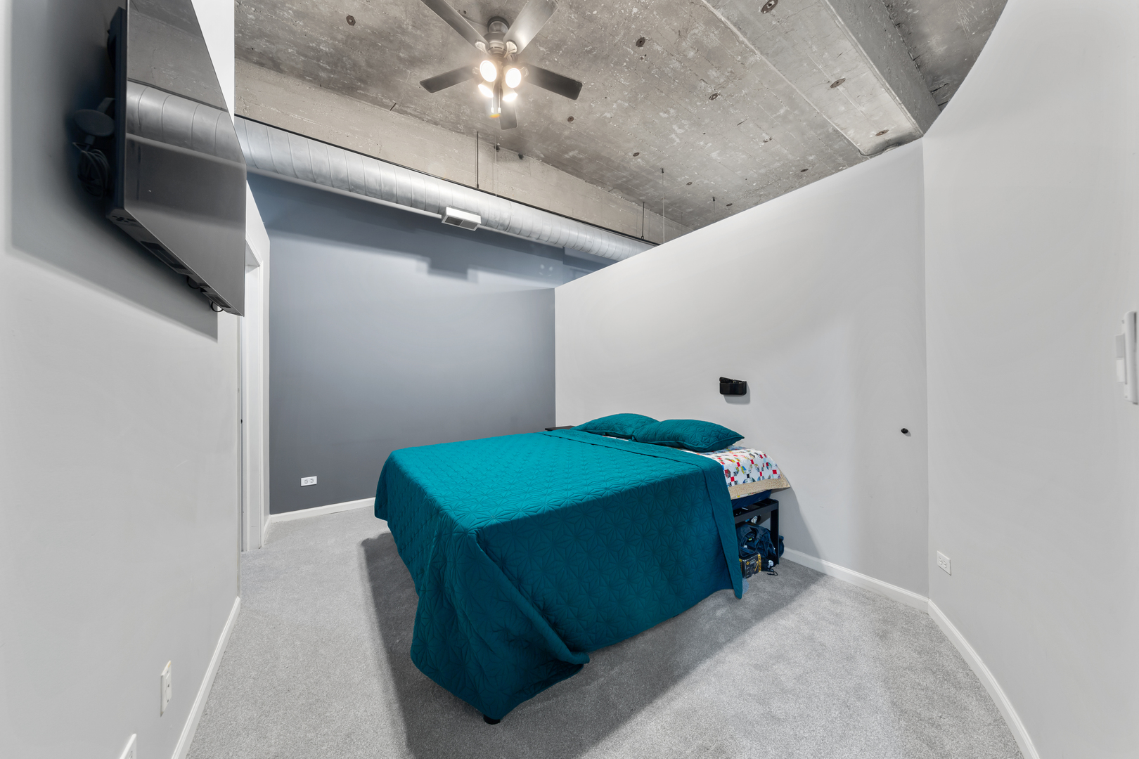 215 North Aberdeen Street, Unit 403A Chicago, IL 60607 - Photo 17 of 22 a room with furniture and a ceiling fan