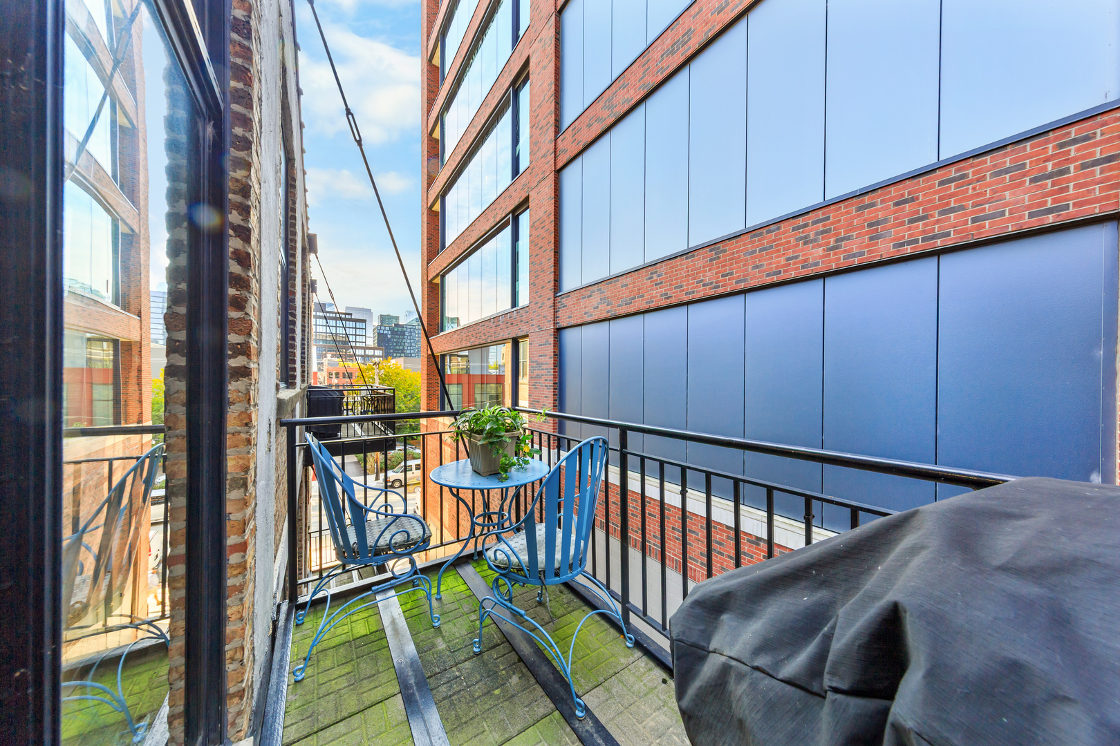 215 North Aberdeen Street, Unit 403A Chicago, IL 60607 - Photo 20 of 22 a view of balcony with furniture