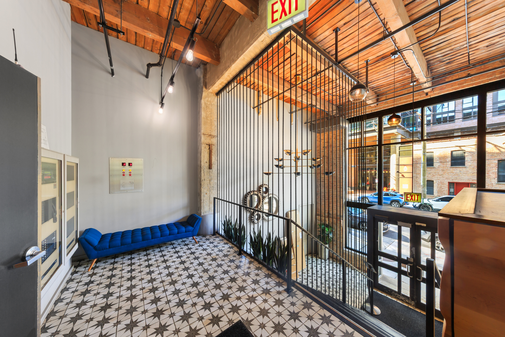 215 North Aberdeen Street, Unit 403A Chicago, IL 60607 - Photo 21 of 22 a view of a room with wooden floor and iron stairs