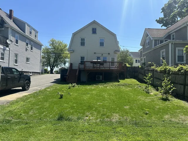 a view of backyard with a garden and plants
