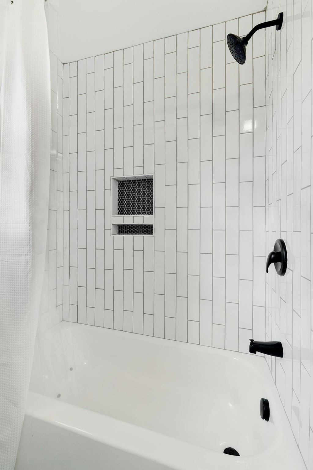 3103 Hillside Road Nashville, TN 37207 - Photo 15 of 23 a bathroom with a bathtub and a shower