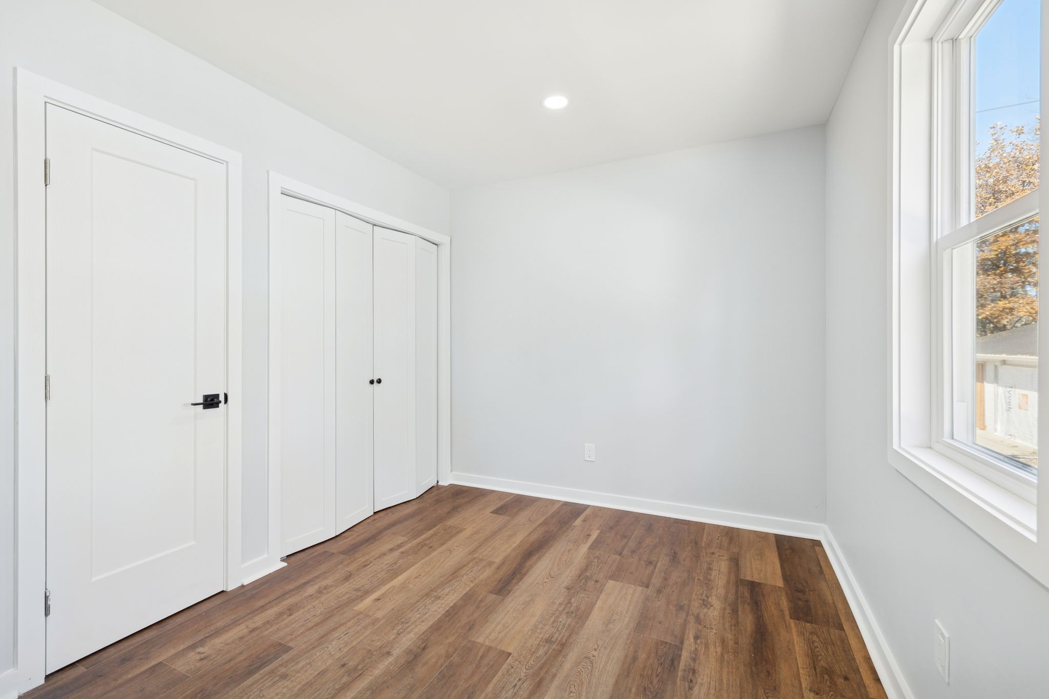 3103 Hillside Road Nashville, TN 37207 - Photo 16 of 23 an empty room with wooden floor and windows