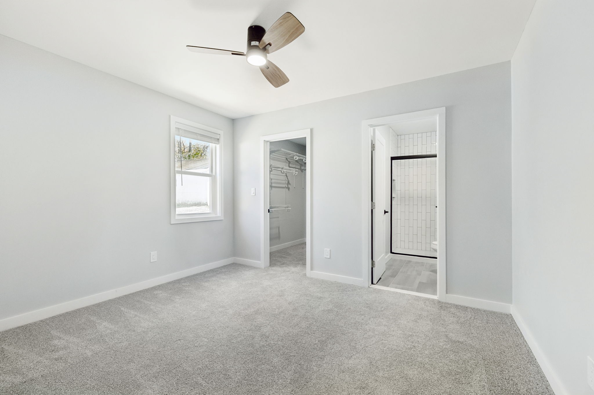3103 Hillside Road Nashville, TN 37207 - Photo 8 of 23 an empty room with windows and fan