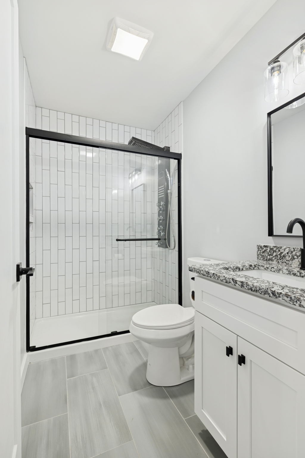 3103 Hillside Road Nashville, TN 37207 - Photo 9 of 23 a bathroom with a granite countertop sink toilet and shower