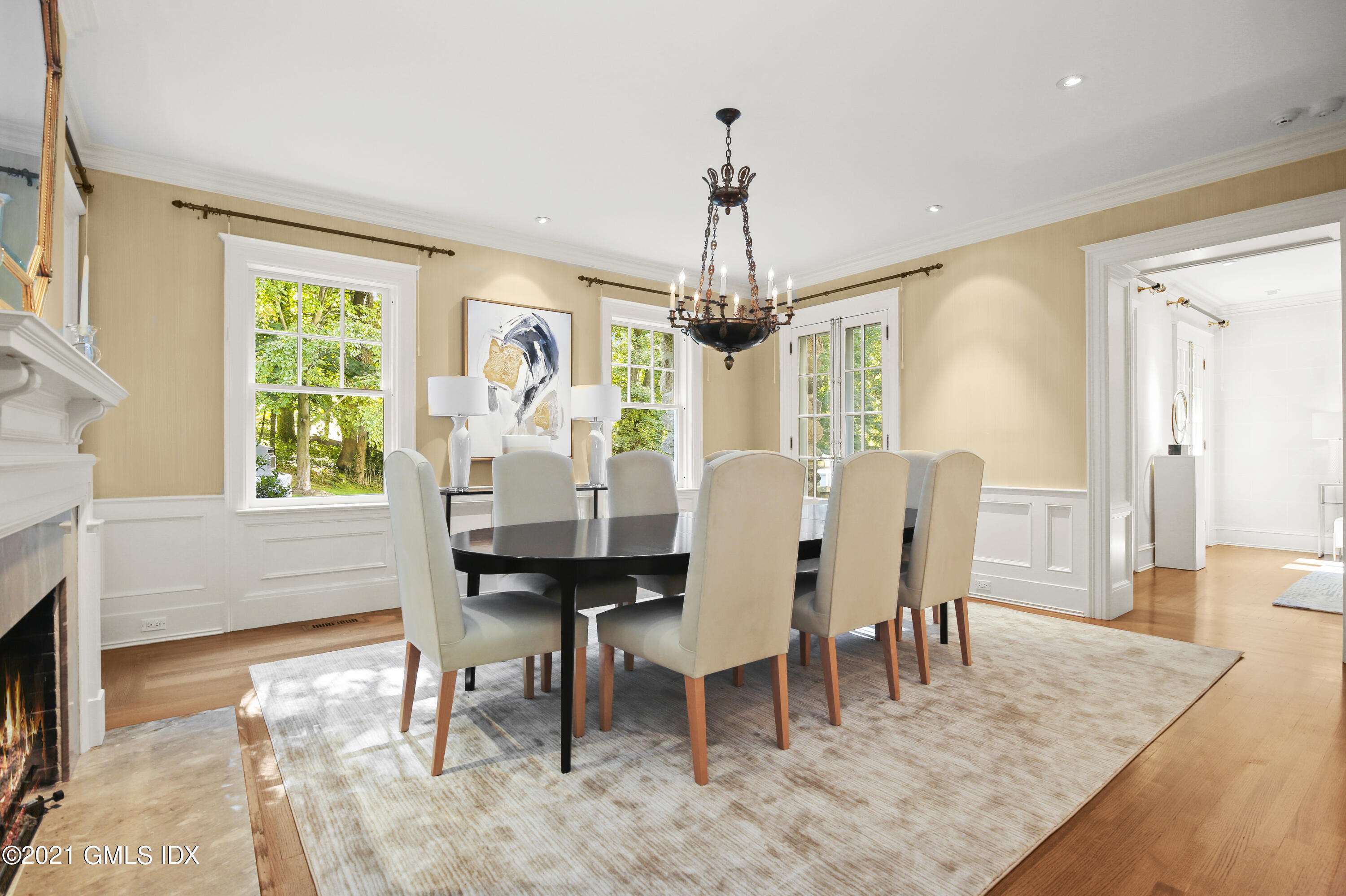 33 Brookridge Drive Greenwich, CT 06830 - Photo 11 of 44 a view of a dining room with furniture window and wooden floor