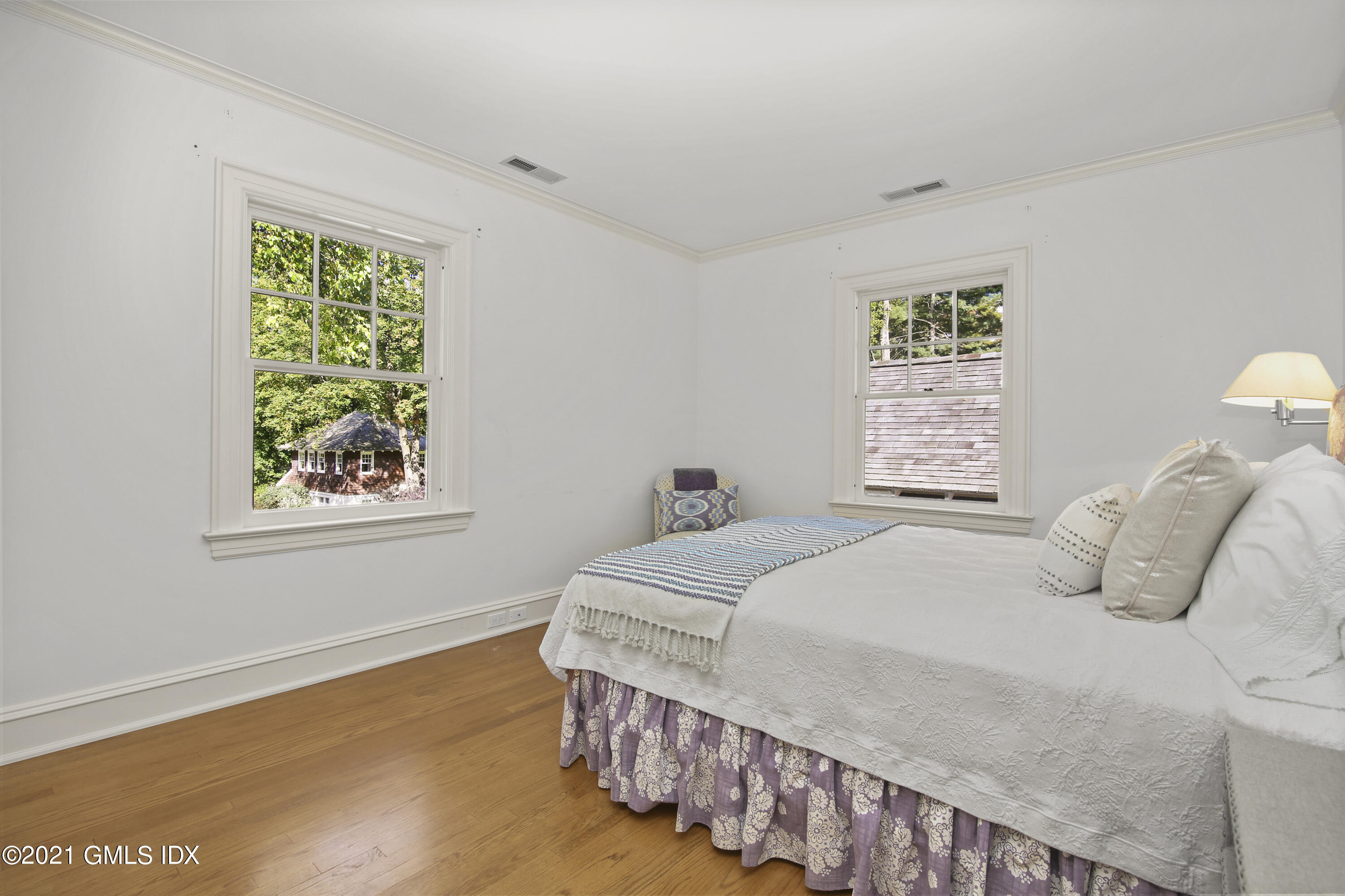 33 Brookridge Drive Greenwich, CT 06830 - Photo 26 of 44 a bedroom with a bed and a window