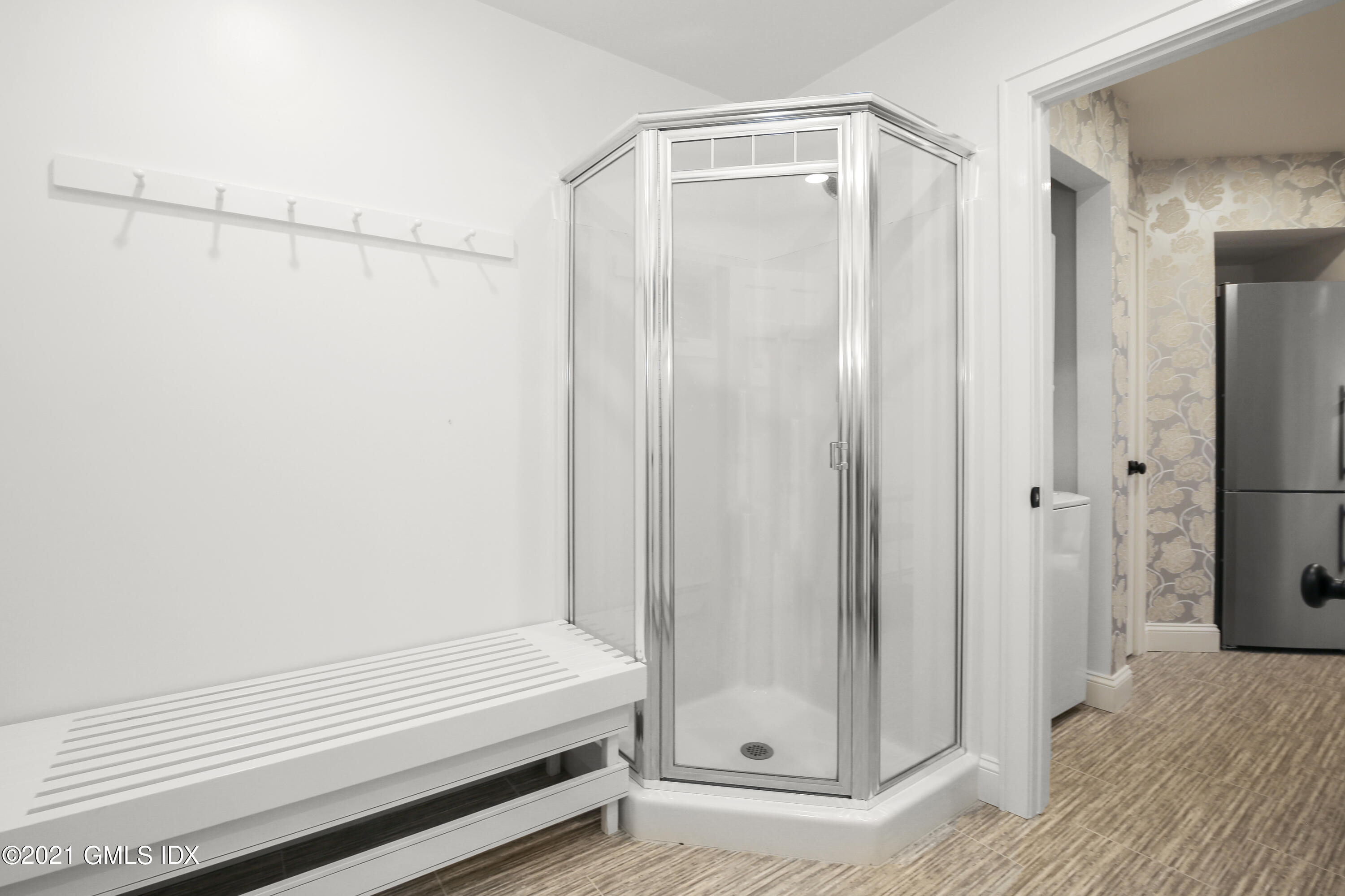 33 Brookridge Drive Greenwich, CT 06830 - Photo 37 of 44 a bathroom with a shower and a tub