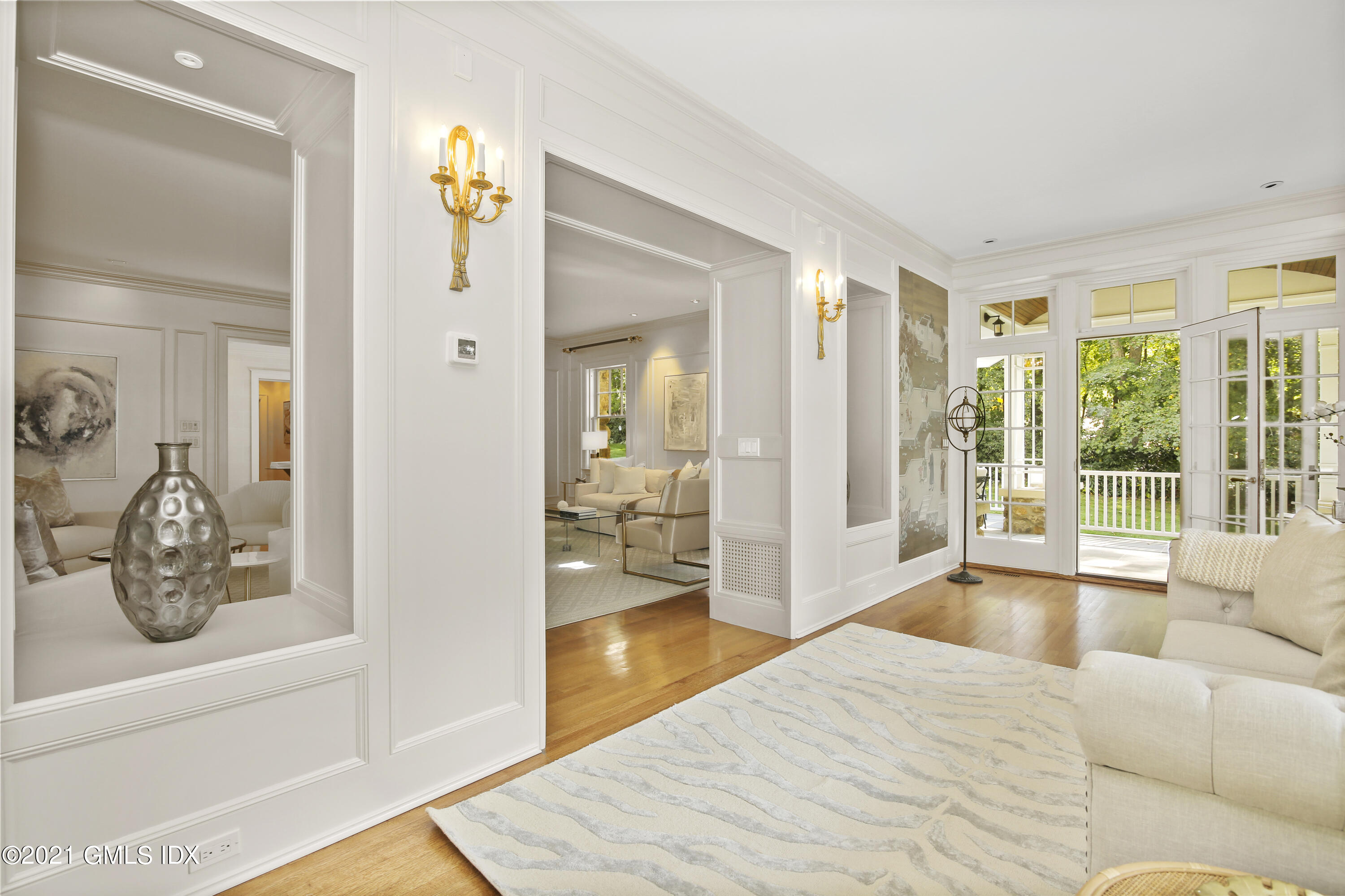 33 Brookridge Drive Greenwich, CT 06830 - Photo 9 of 44 a bedroom with furniture and a large window