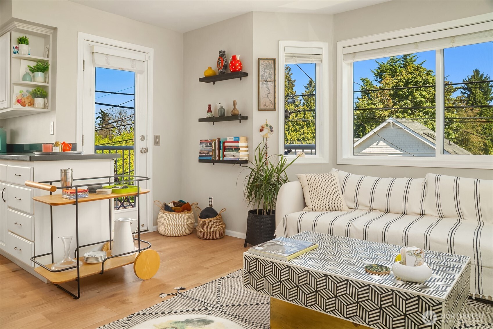 a living room with furniture and a window