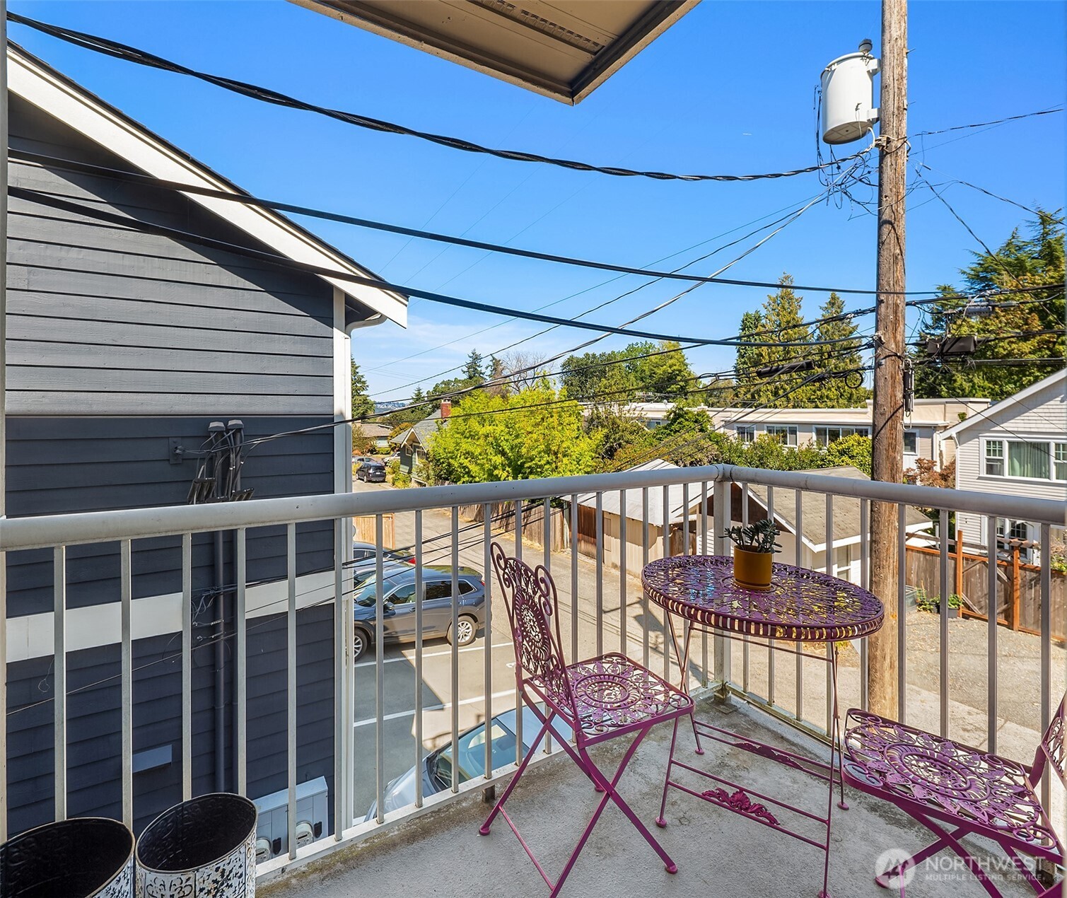 2116 California Avenue Southwest, Unit 201 Seattle, WA 98116 - Photo 13 of 17 a view of a chairs and table in patio