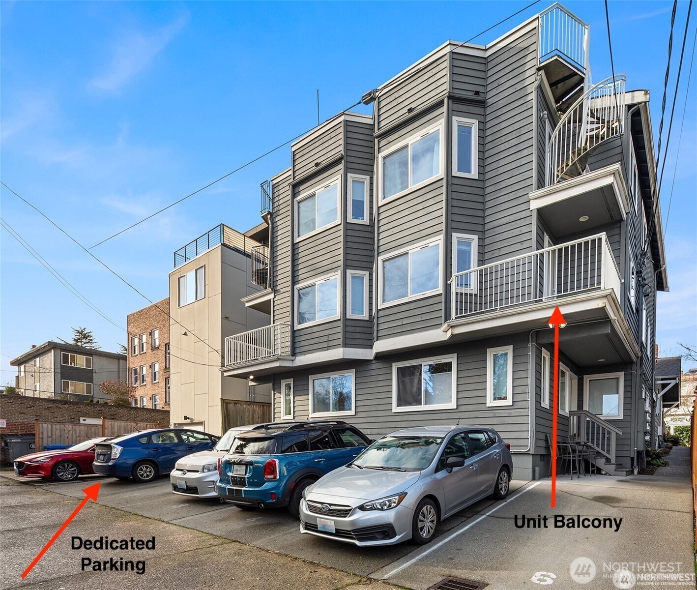 2116 California Avenue Southwest, Unit 201 Seattle, WA 98116 - Photo 17 of 17 a car parked in front of a building