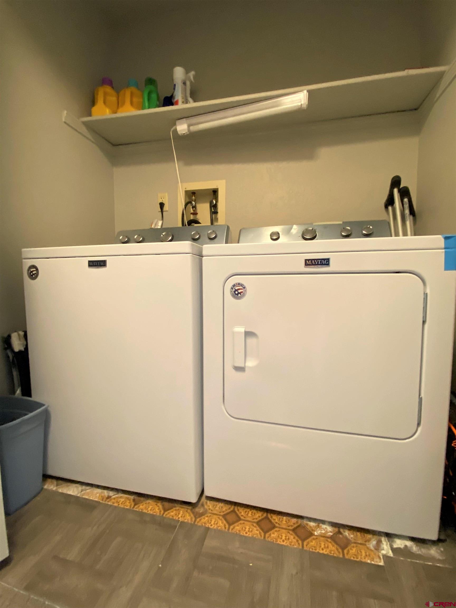 255 Pine Ridge Loop, Unit C5 Durango, CO 81301 - Photo 23 of 32 a utility room with dryer and washer