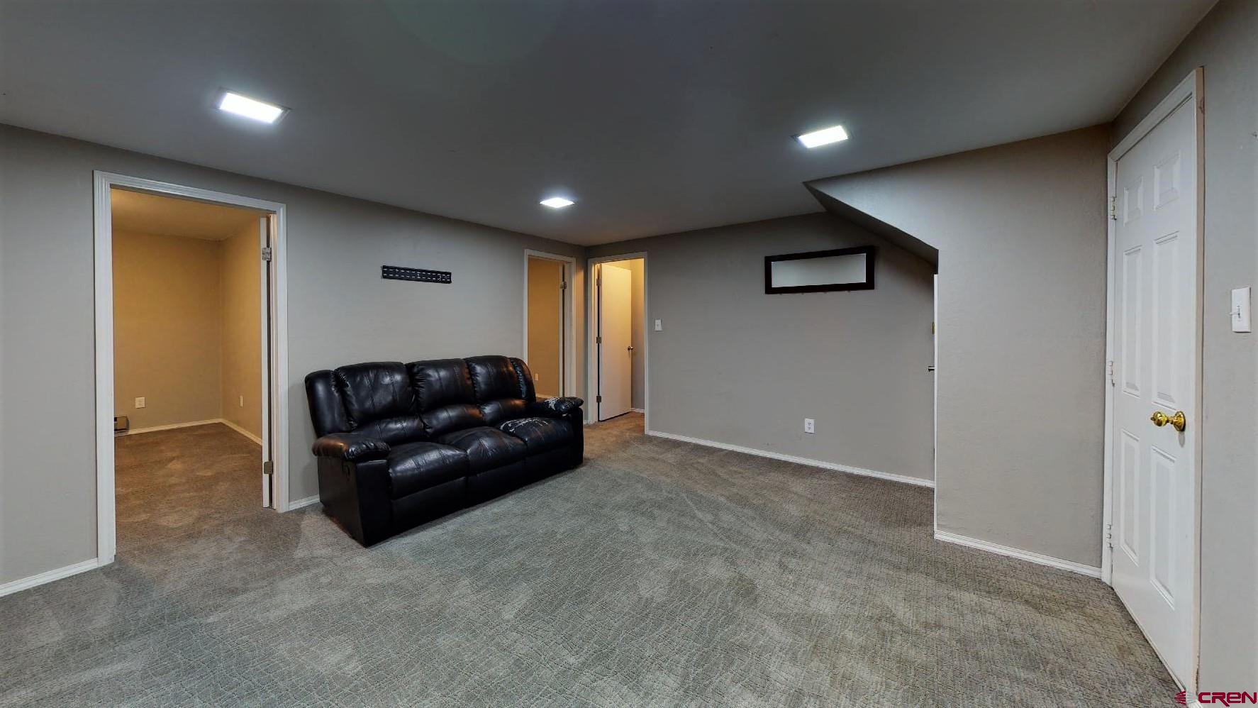 255 Pine Ridge Loop, Unit C5 Durango, CO 81301 - Photo 25 of 32 a living room with furniture