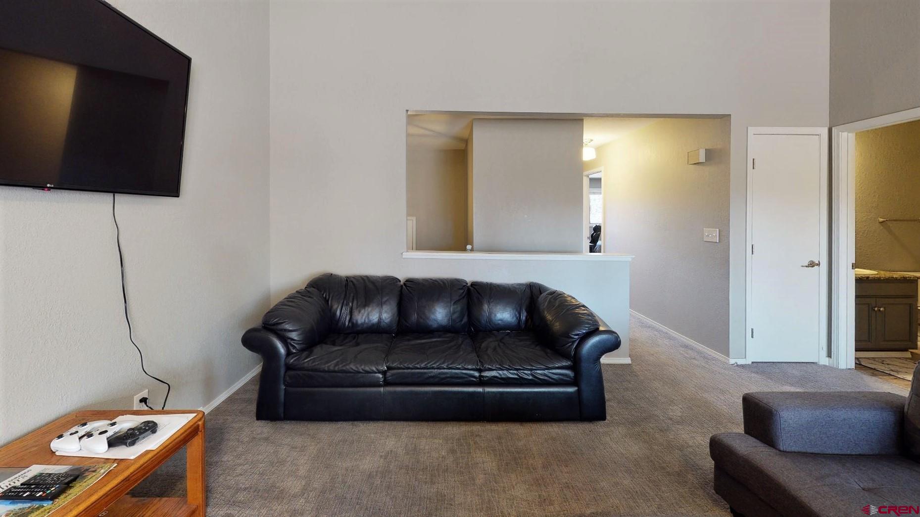 255 Pine Ridge Loop, Unit C5 Durango, CO 81301 - Photo 8 of 32 a living room with furniture