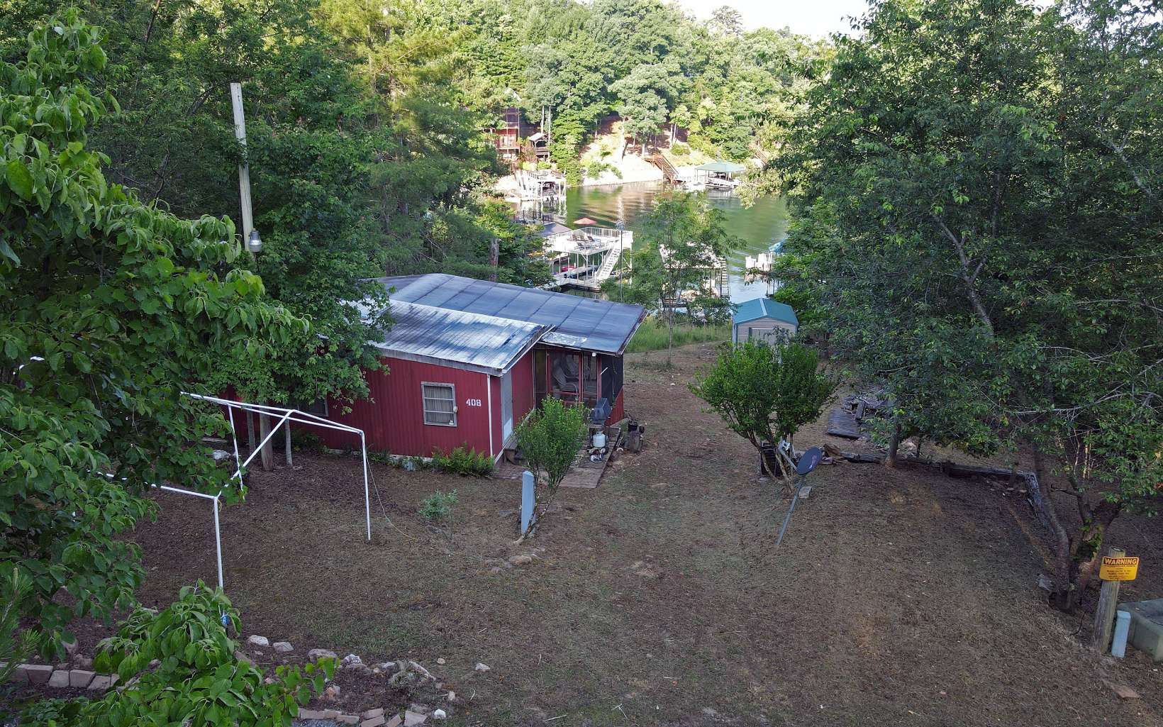 408 Timmy Circle Morganton, GA 30560 - Photo 8 of 31 a backyard of a house with table and chairs