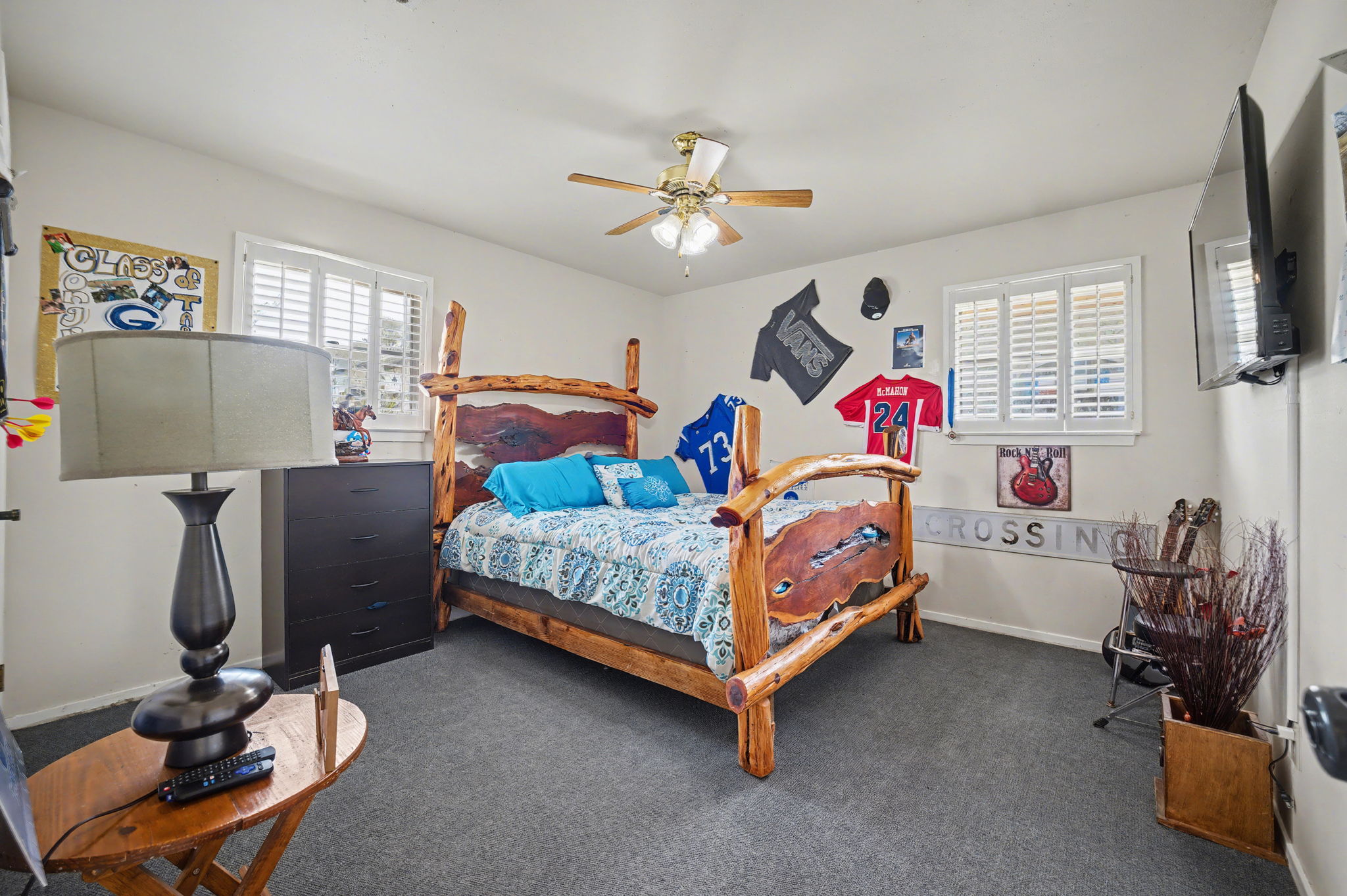 103 Oak Ridge Circle Georgetown, TX 78628 - Photo 18 of 22 Bedroom with dark carpet and a ceiling fan
