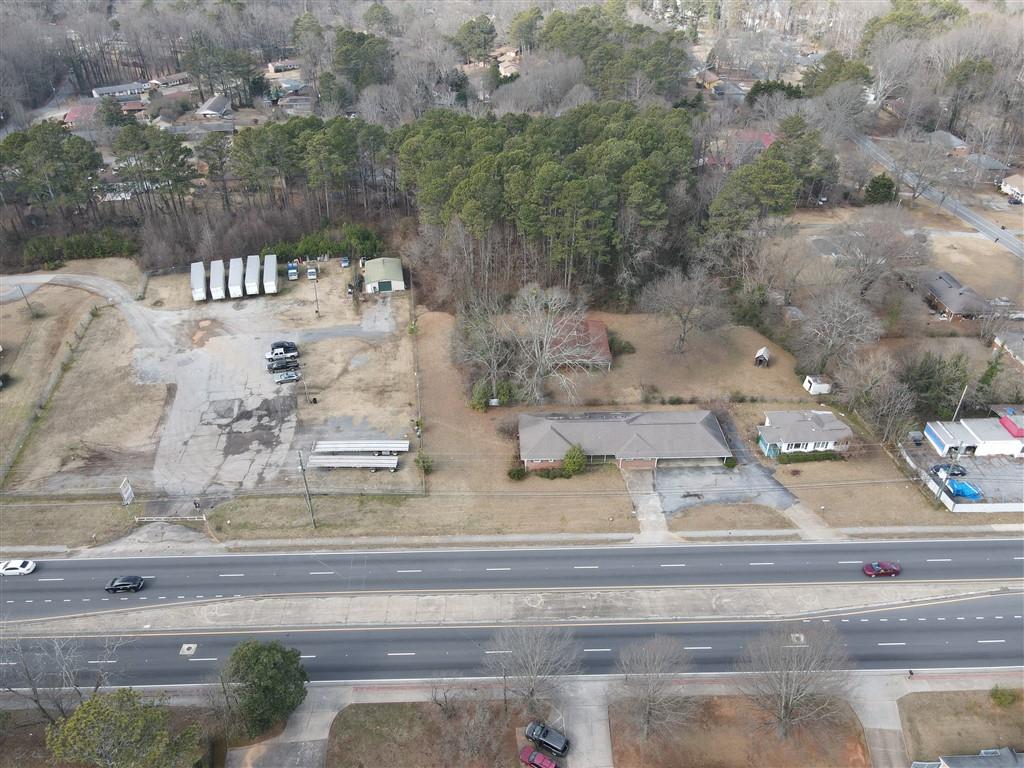 4582 Austell Road Austell, GA 30106 - Photo 1 of 6 an aerial view of residential houses with outdoor space