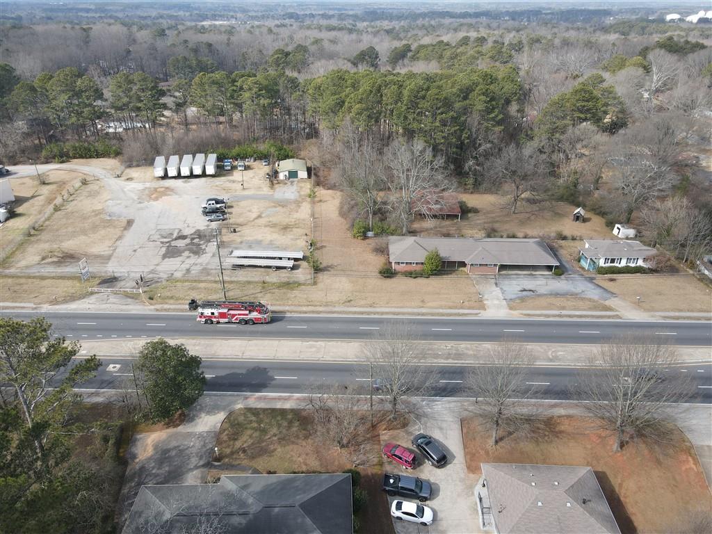 4582 Austell Road Austell, GA 30106 - Photo 2 of 6 a view of car parked on road with trees