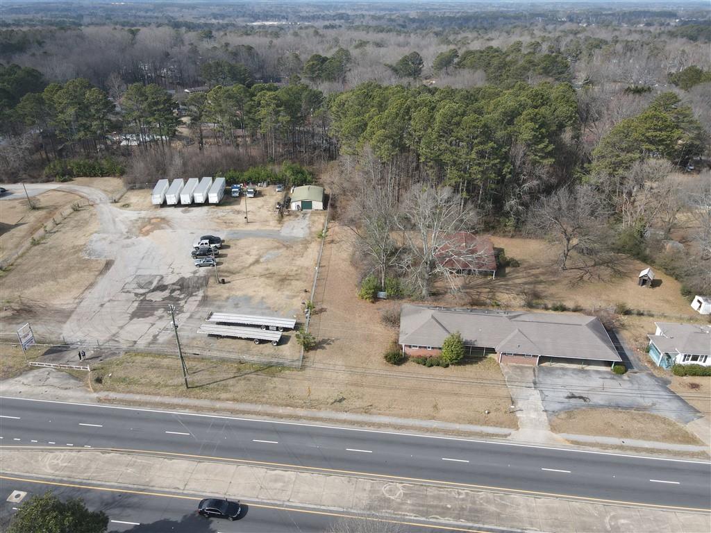 4582 Austell Road Austell, GA 30106 - Photo 3 of 6 an aerial view of residential houses with outdoor space