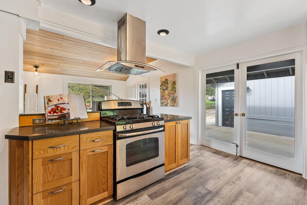 98 Paddon Road Watsonville, CA 95076 - Photo 12 of 28 a kitchen with stove and cabinets