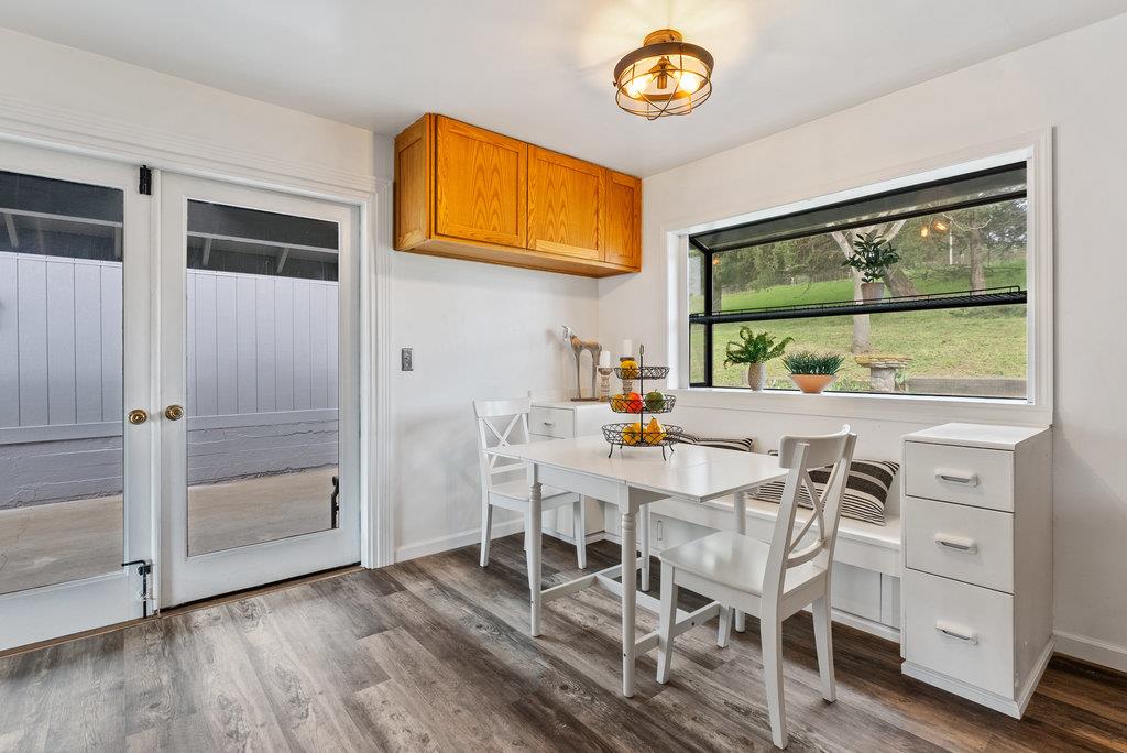 98 Paddon Road Watsonville, CA 95076 - Photo 13 of 28 a dining room with furniture a window and wooden floor