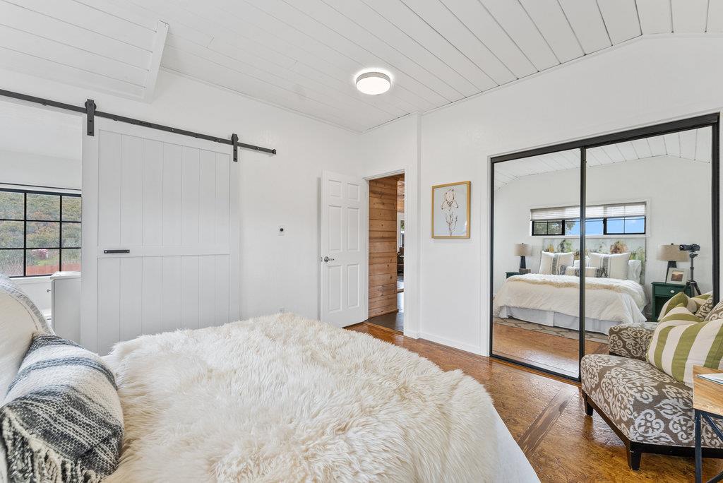 98 Paddon Road Watsonville, CA 95076 - Photo 16 of 28 a bedroom with a large bed and a window