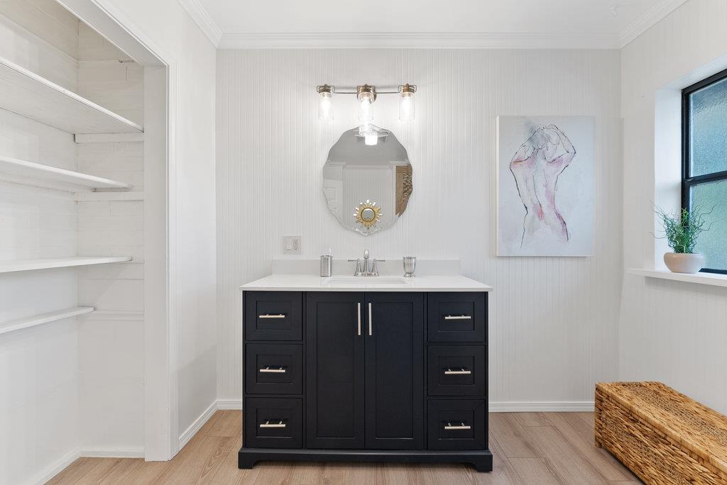 98 Paddon Road Watsonville, CA 95076 - Photo 18 of 28 a bathroom with a sink and a mirror