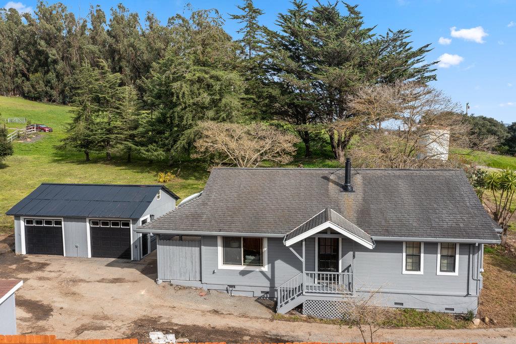 98 Paddon Road Watsonville, CA 95076 - Photo 2 of 28 a house that has a tree in front of it