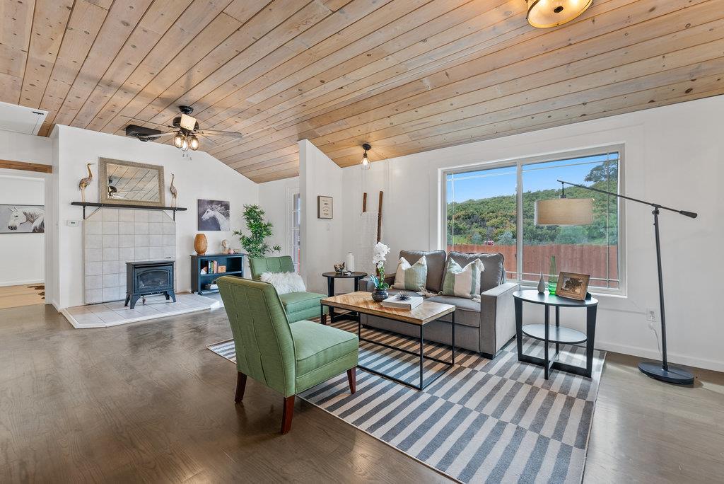 98 Paddon Road Watsonville, CA 95076 - Photo 5 of 28 a living room with furniture and a fireplace